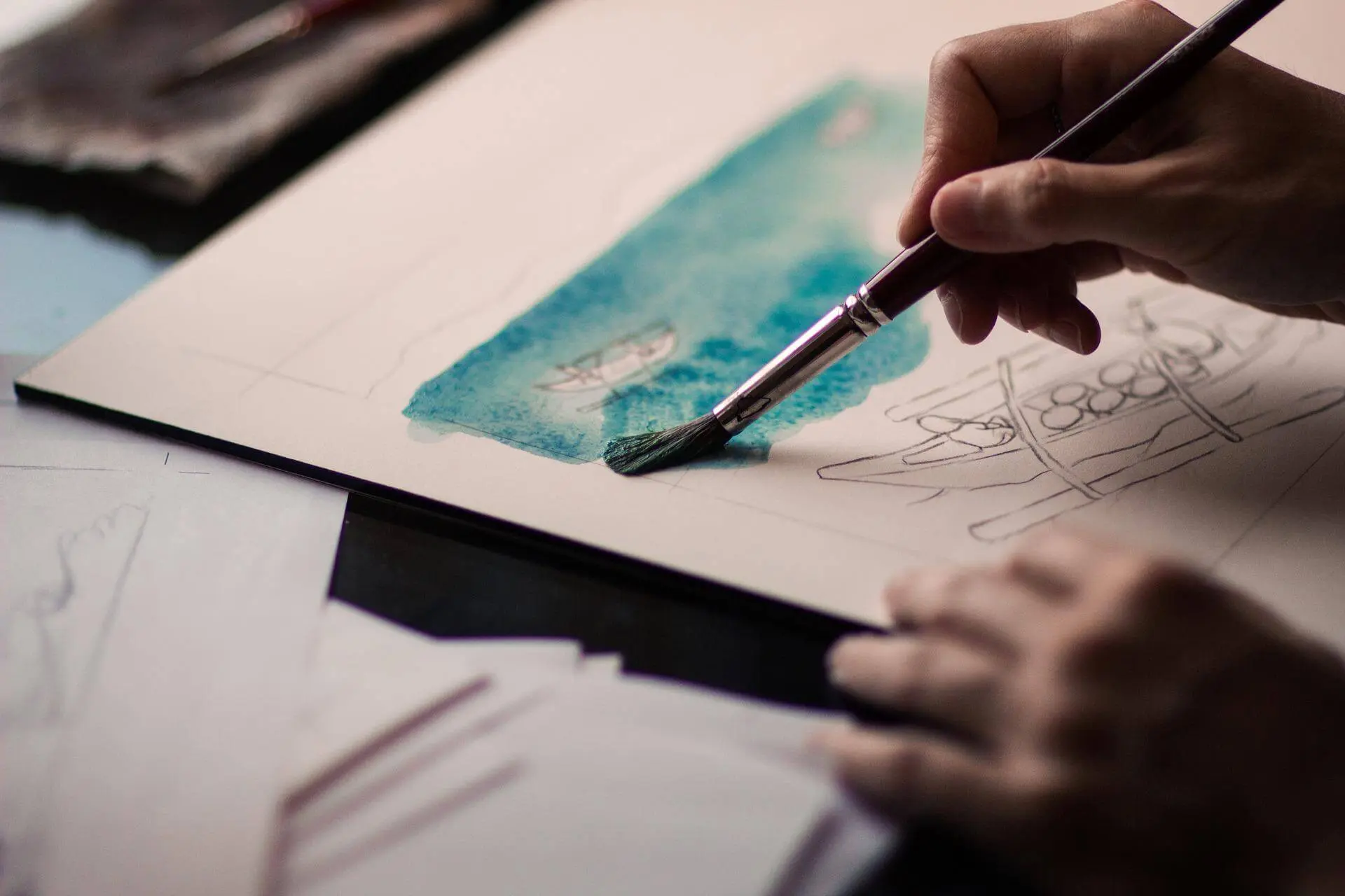 Watercolor painting Hands painting a scene watercolors